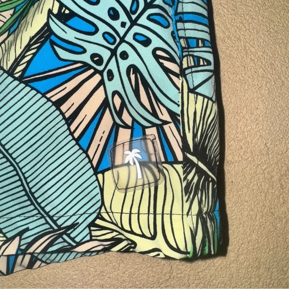 Blue and Green Board Shorts with Tropical Print